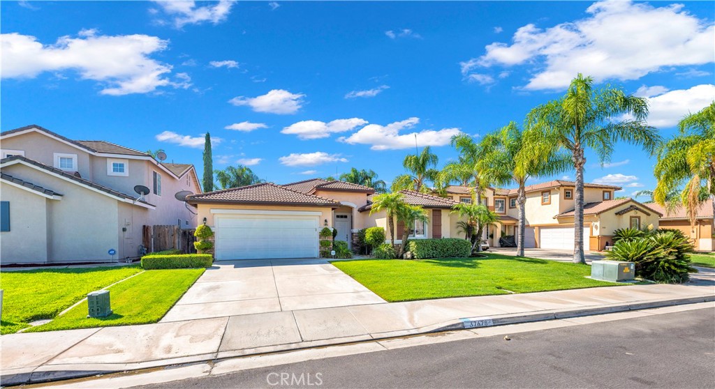 37678 Newcastle Road Murrieta, CA 92563 - Photo 4 of 44 a view of a house with a yard