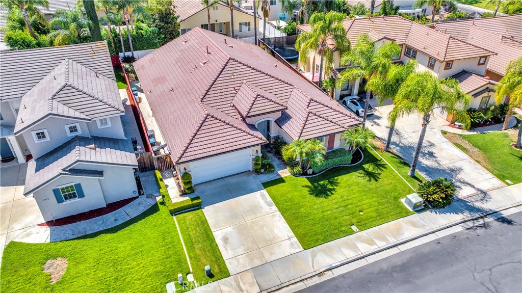 37678 Newcastle Road Murrieta, CA 92563 - Photo 5 of 44 a view of a house with a yard