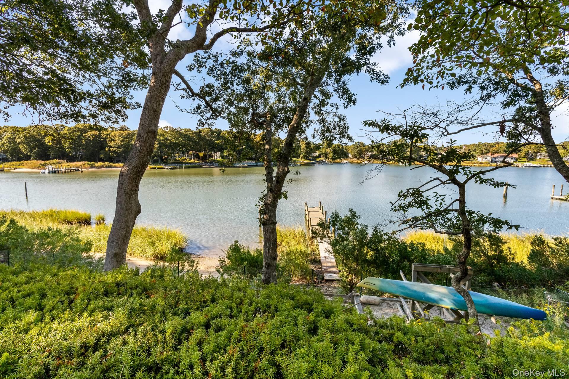 3693 Pine Neck Road Southold, NY 11971 - Photo 13 of 16 Water view with a boat dock