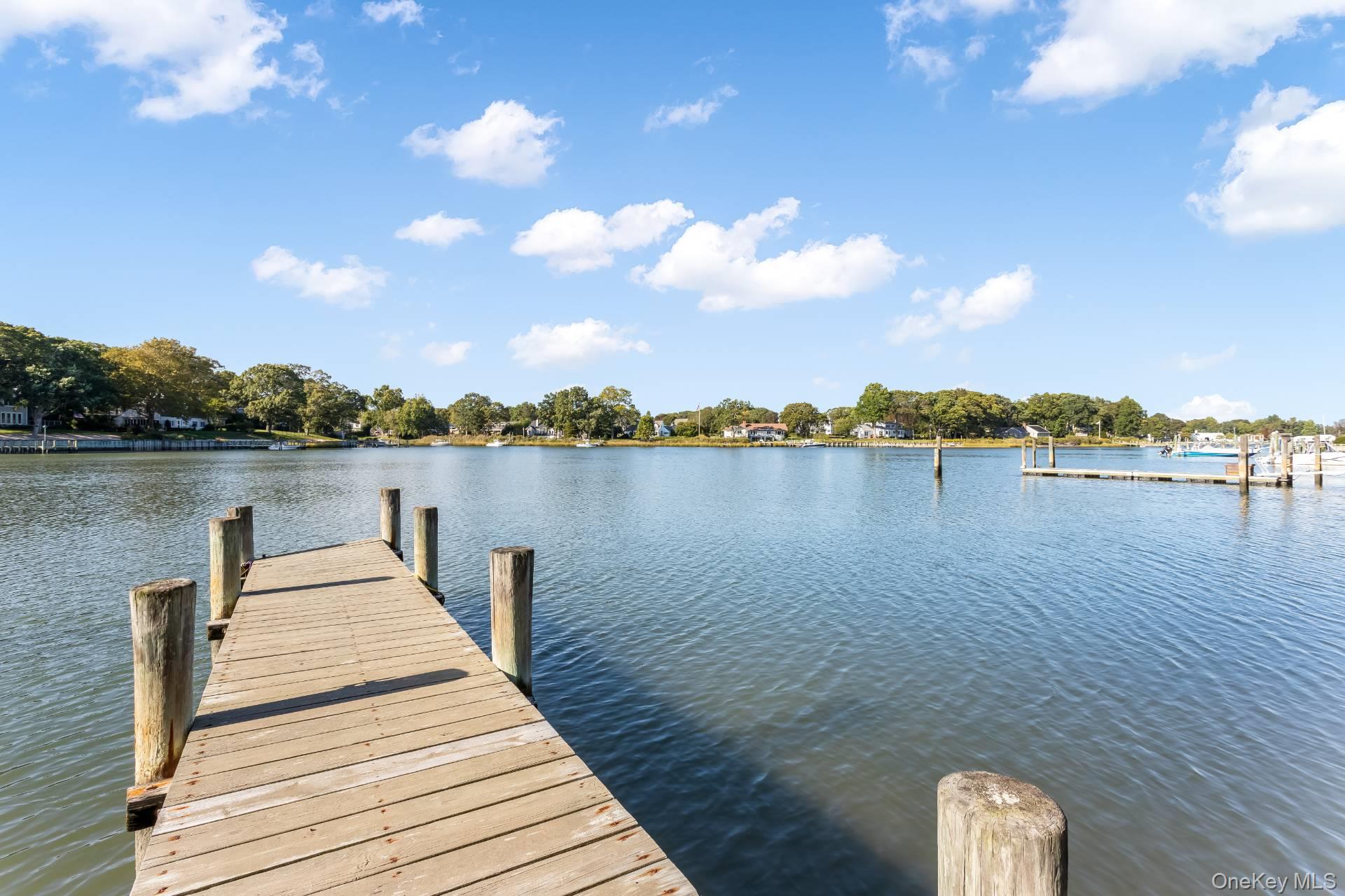 3693 Pine Neck Road Southold, NY 11971 - Photo 14 of 16 Dock area featuring a water view