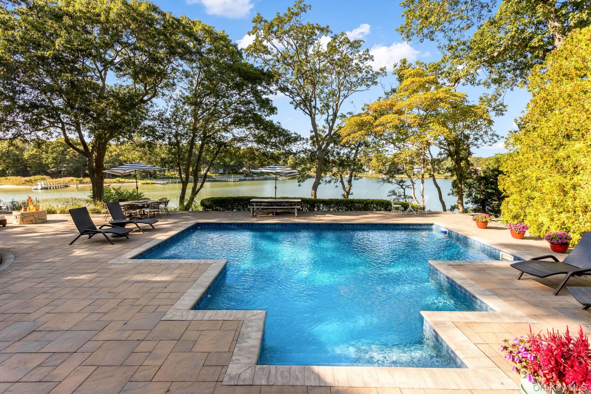 3693 Pine Neck Road Southold, NY 11971 - Photo 4 of 16 Outdoor pool with a patio and a water view