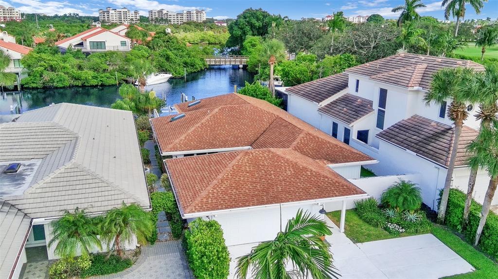 17026 Bay Street Jupiter, FL 33477 - Photo 13 of 77 an aerial view of a house with garden space and lake view