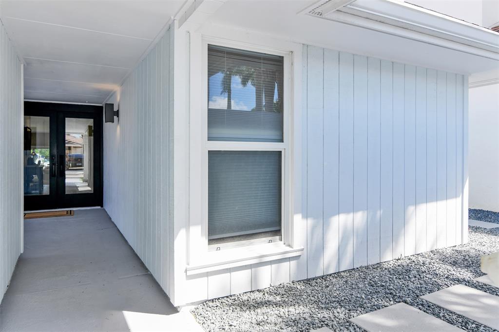 17026 Bay Street Jupiter, FL 33477 - Photo 17 of 77 a view of livingroom with furniture and front door