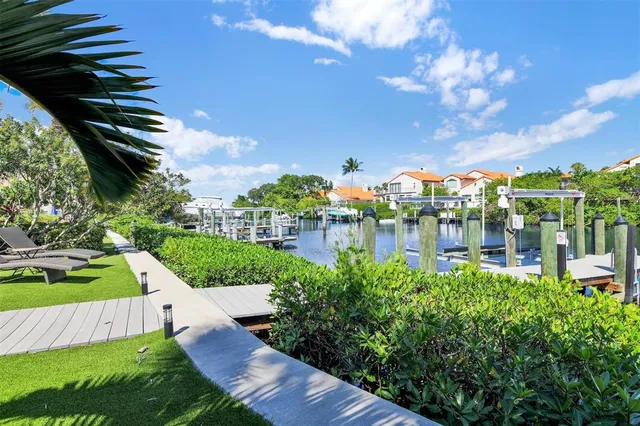 a bathroom with a sink a mirror and a shower
