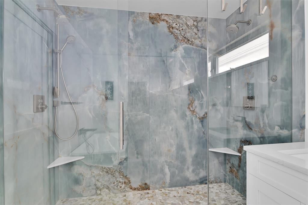 17026 Bay Street Jupiter, FL 33477 - Photo 64 of 77 a bathroom with a shower
