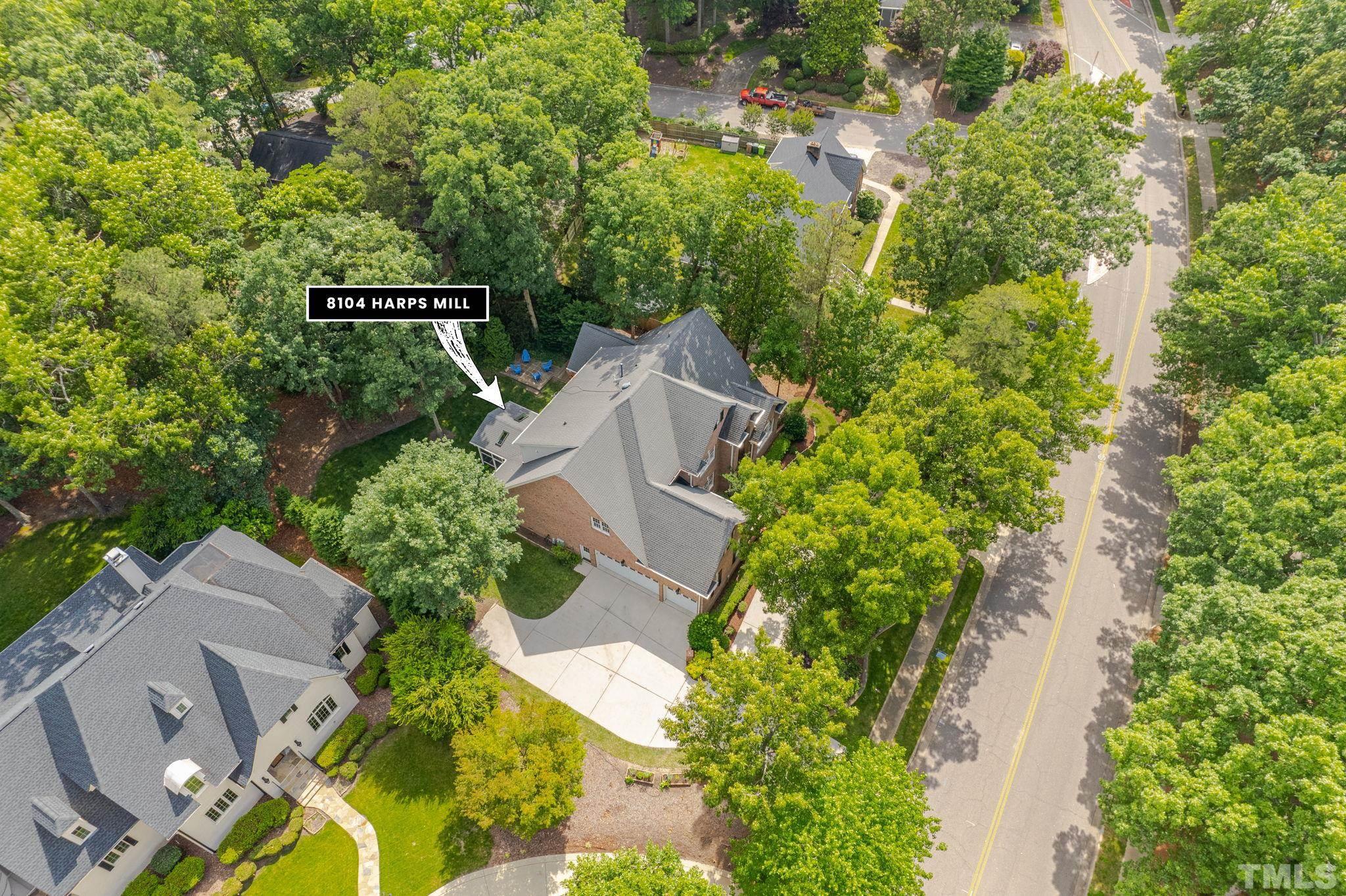 8104 Harps Mill Road Raleigh, NC 27615 - Photo 56 of 57 an aerial view of a house with yard swimming pool and outdoor seating