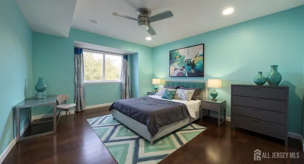 a bedroom with a bed and a table