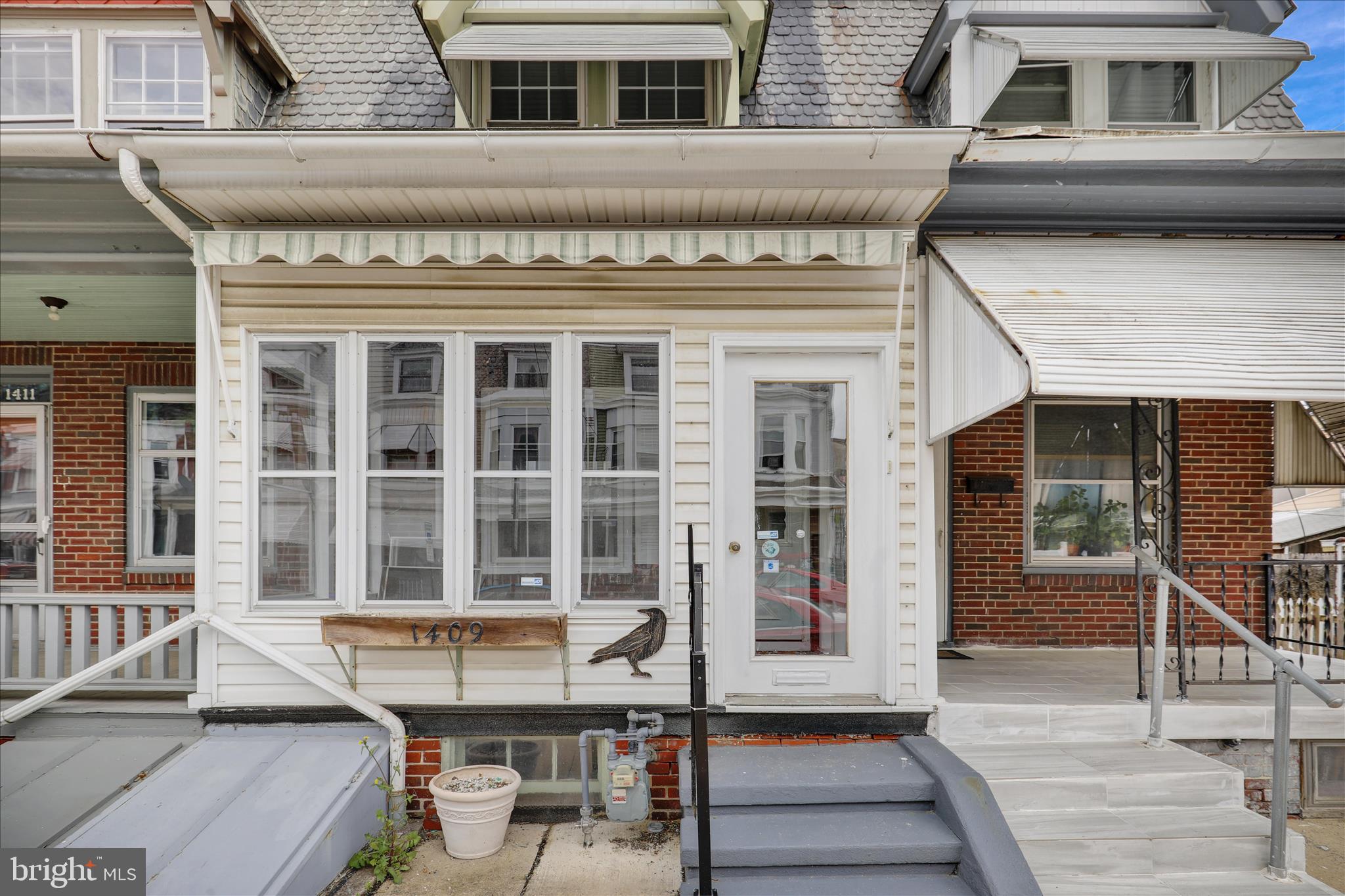1409 Church Street Reading, PA 19601 - Photo 2 of 23 aerial view of a house with a table and chair