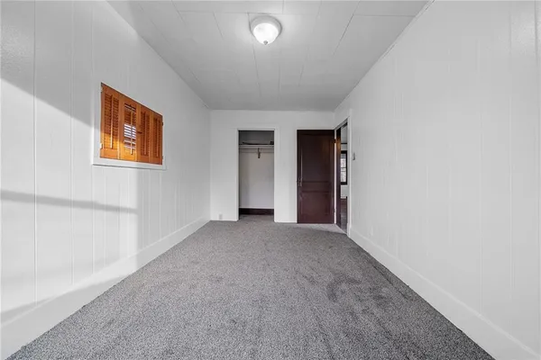 an empty room with a natural light
