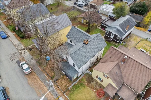 an aerial view of residential house with outdoor space