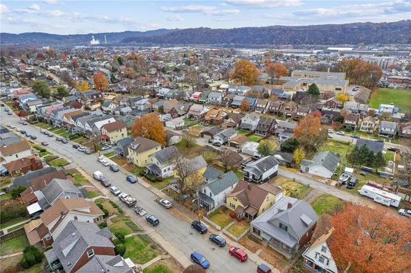 an aerial view of residential house with outdoor space