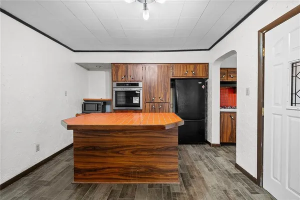 a room with a table and chairs