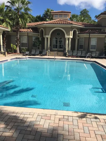 a swimming pool with outdoor view