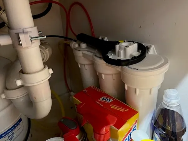 a bathroom with a toilet and a sink