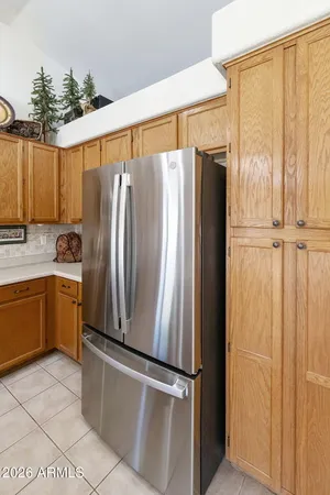a view of a kitchen with a refrigerator