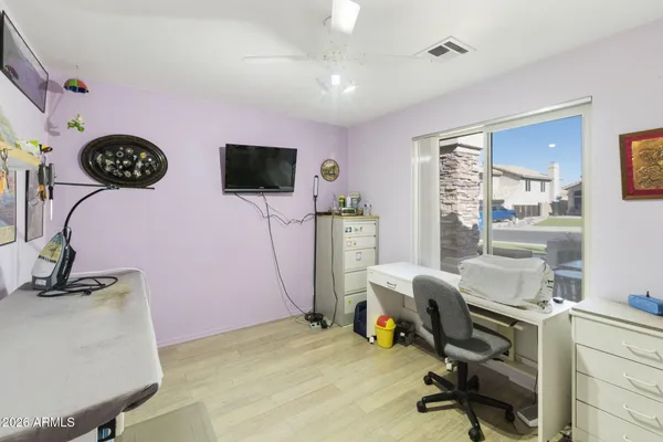 a view of a livingroom with furniture and a flat screen tv