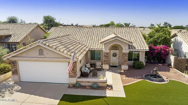 a front view of a house with entertaining space