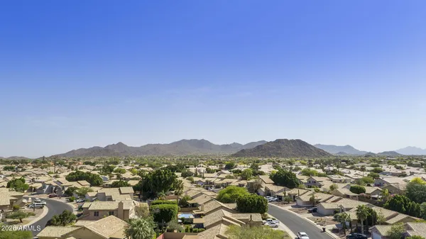 a view of a city with mountain