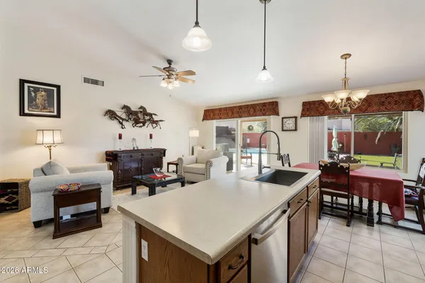 a very nice looking dining room with a table and chairs