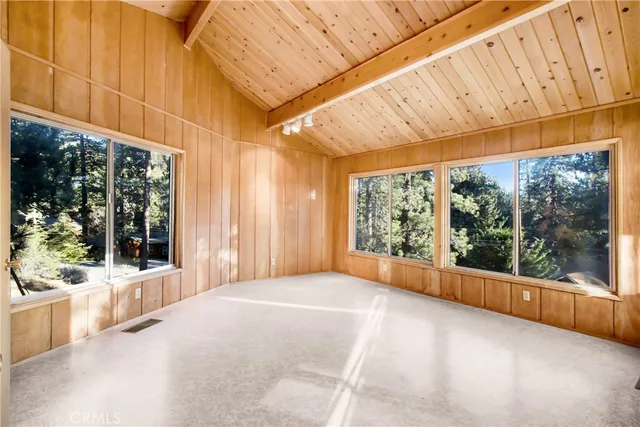 a view of a bathroom with a tub and shower