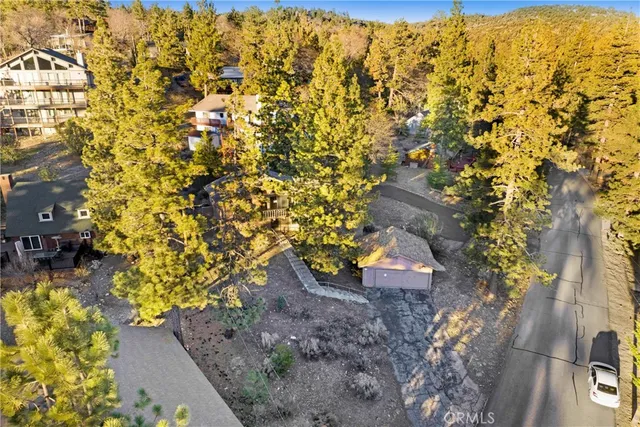 a view of swimming pool and mountain in the back