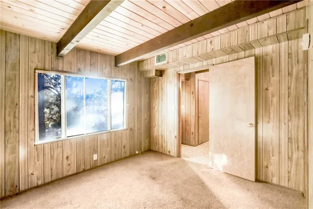 a view of a back yard from a hallway