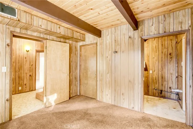 a view of a entryway with wooden walls