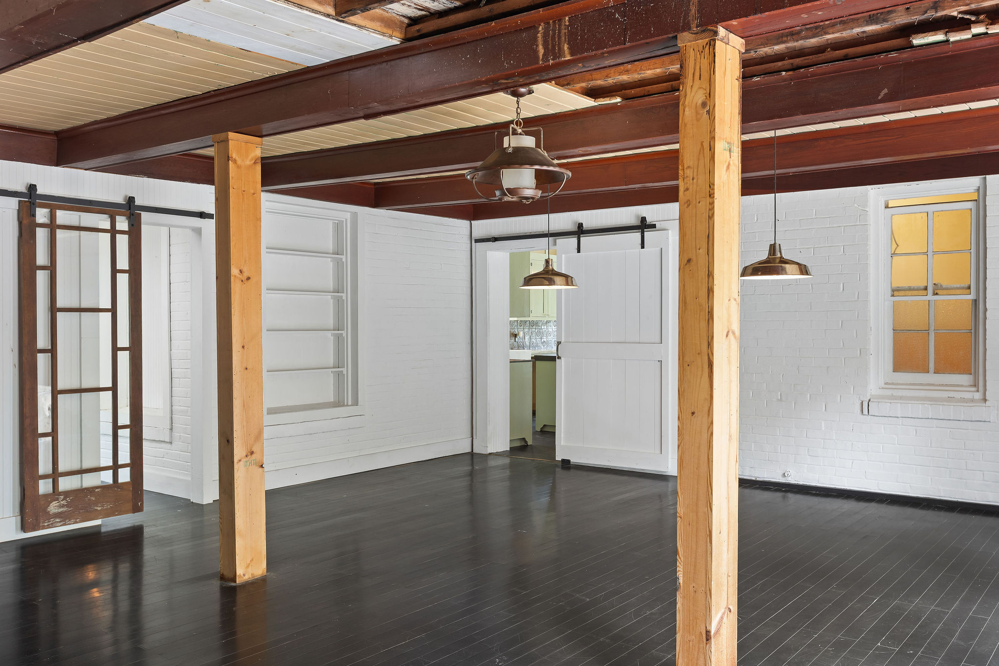 948 Maple Street Lockhart, TX 78644 - Photo 15 of 40 Additional den and office space, totaling approx 600 sq ft, opens to a private courtyard.