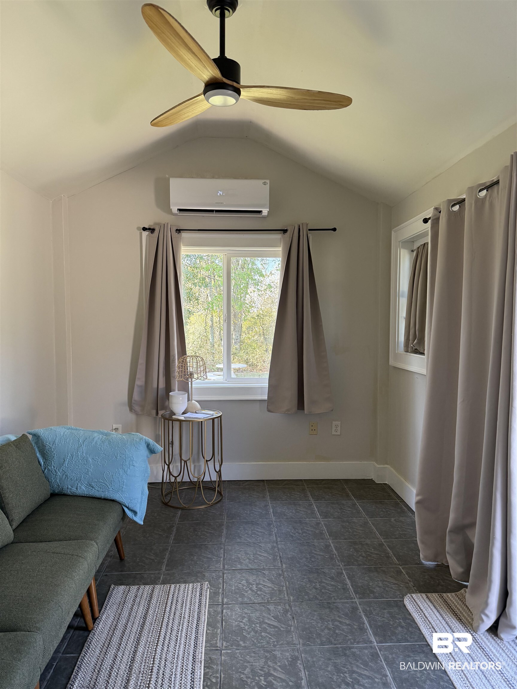 28114 Preserve Trail, Unit 190 Elberta, AL 36530 - Photo 22 of 69 Living area featuring a mini split for heating / cooling, a ceiling fan, and lofted ceiling