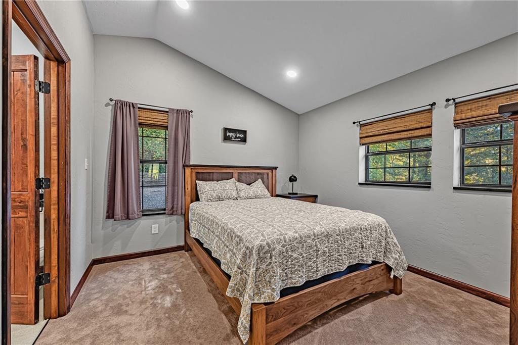 539 Lake Road Addison, PA 15411 - Photo 14 of 43 a bedroom with a bed and window