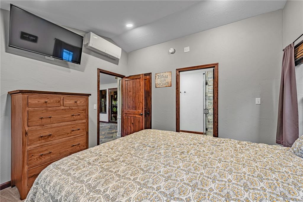 539 Lake Road Addison, PA 15411 - Photo 15 of 43 a bedroom with a bed and a dresser