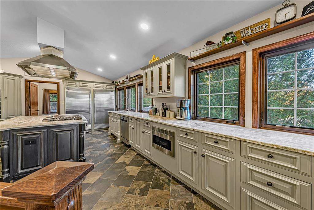539 Lake Road Addison, PA 15411 - Photo 27 of 43 a kitchen with sink stove and cabinets