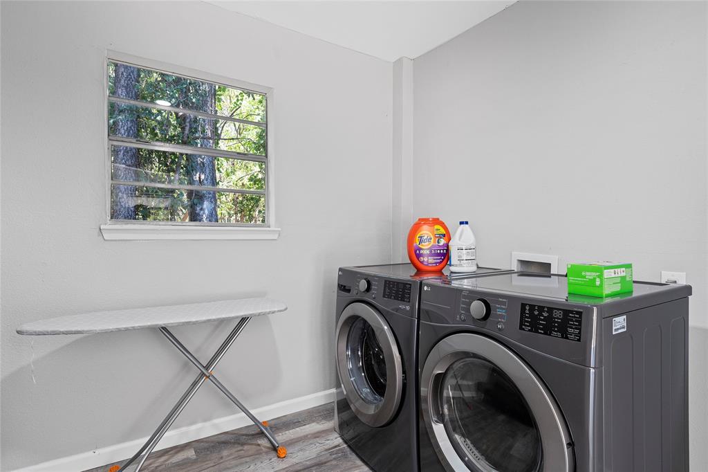 1900 North 6th Street Waco, TX 76708 - Photo 21 of 23 a view of livingroom with washer and dryer
