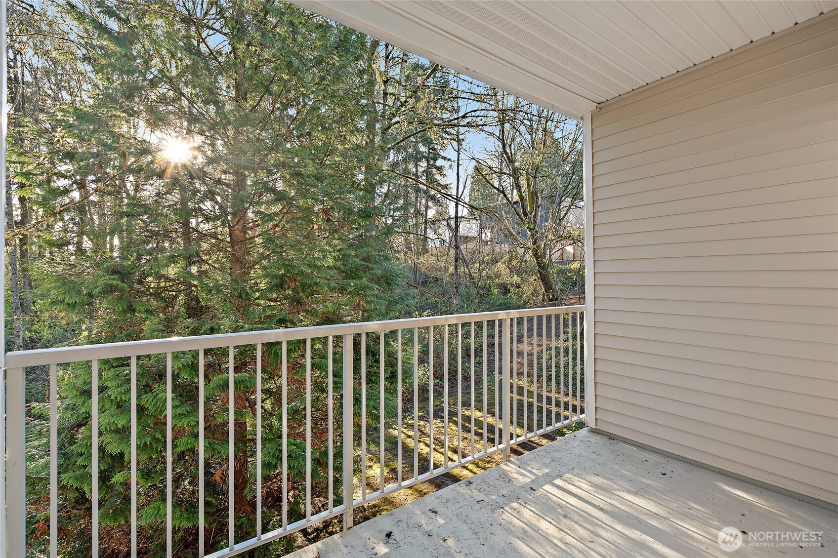 12122 Northeast 171st Place, Unit D201 Bothell, WA 98011 - Photo 12 of 33 a view of balcony with wooden floor