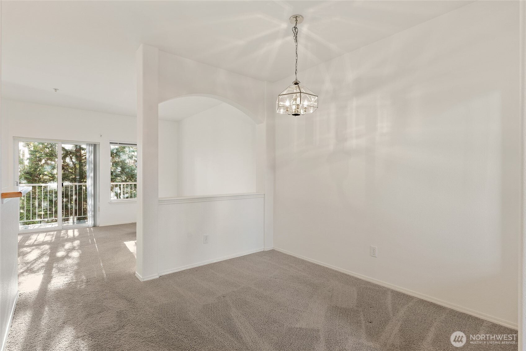 12122 Northeast 171st Place, Unit D201 Bothell, WA 98011 - Photo 14 of 33 an empty room with windows