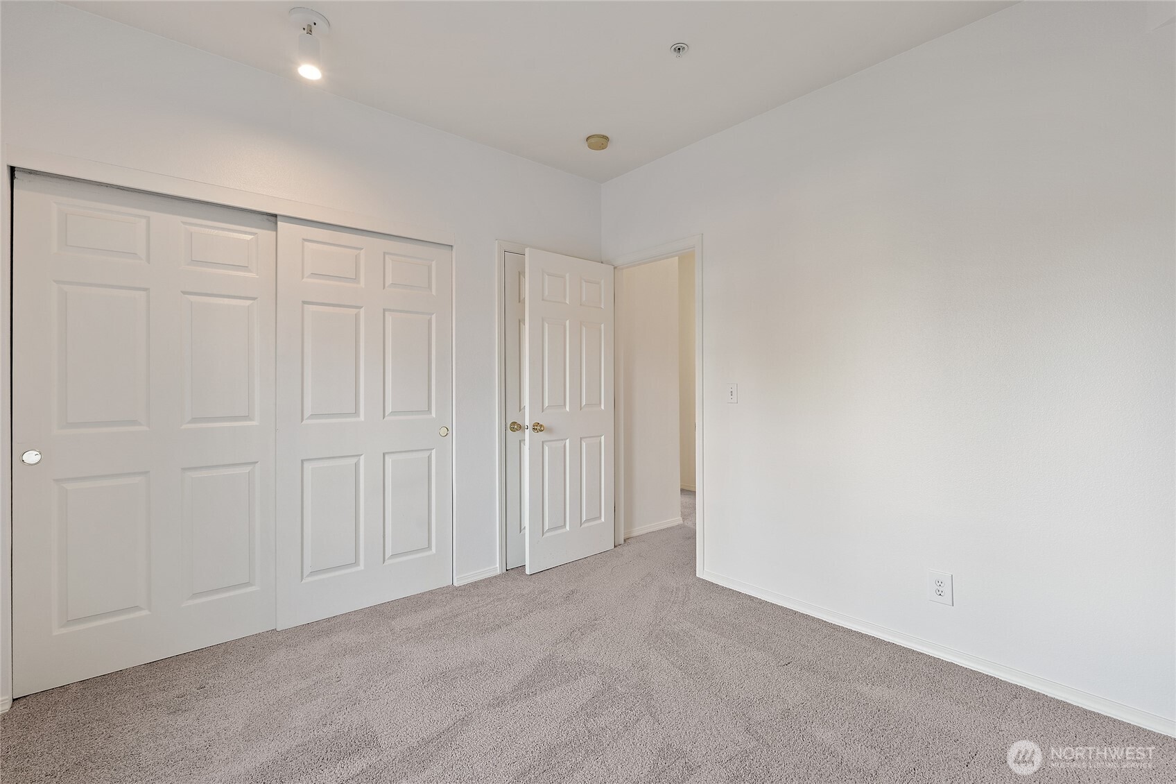 12122 Northeast 171st Place, Unit D201 Bothell, WA 98011 - Photo 27 of 33 a view of an empty room