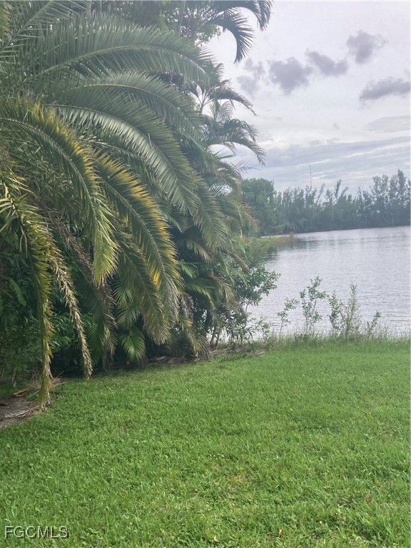 5619 Marina Road Bokeelia, FL 33922 - Photo 18 of 18 a view of a lake from a yard