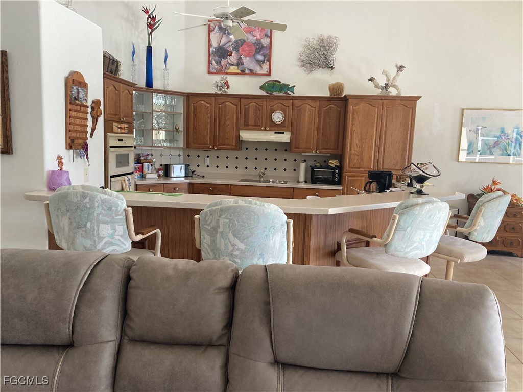 5619 Marina Road Bokeelia, FL 33922 - Photo 8 of 18 a living room with furniture and a window