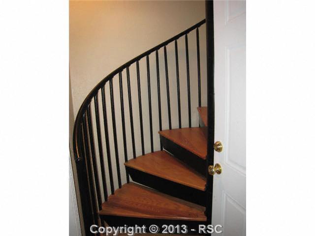 8650 Wildridge Road Colorado Springs, CO 80908 - Photo 17 of 25 Spiral staircase