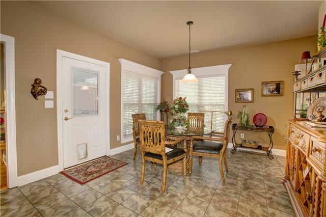 32015 Ardmore Ridge Road Ardmore, TN 38449 - Photo 17 of 19 Breakfast Room right off of kitchen with outside entrance to back porch and fenced in back yard!