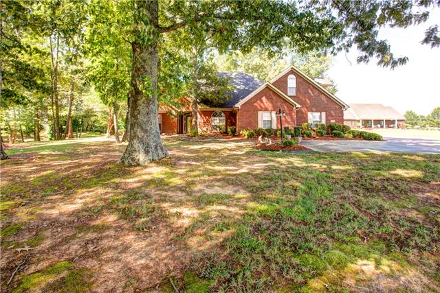 32015 Ardmore Ridge Road Ardmore, TN 38449 - Photo 3 of 19 front yard view with large shade trees
