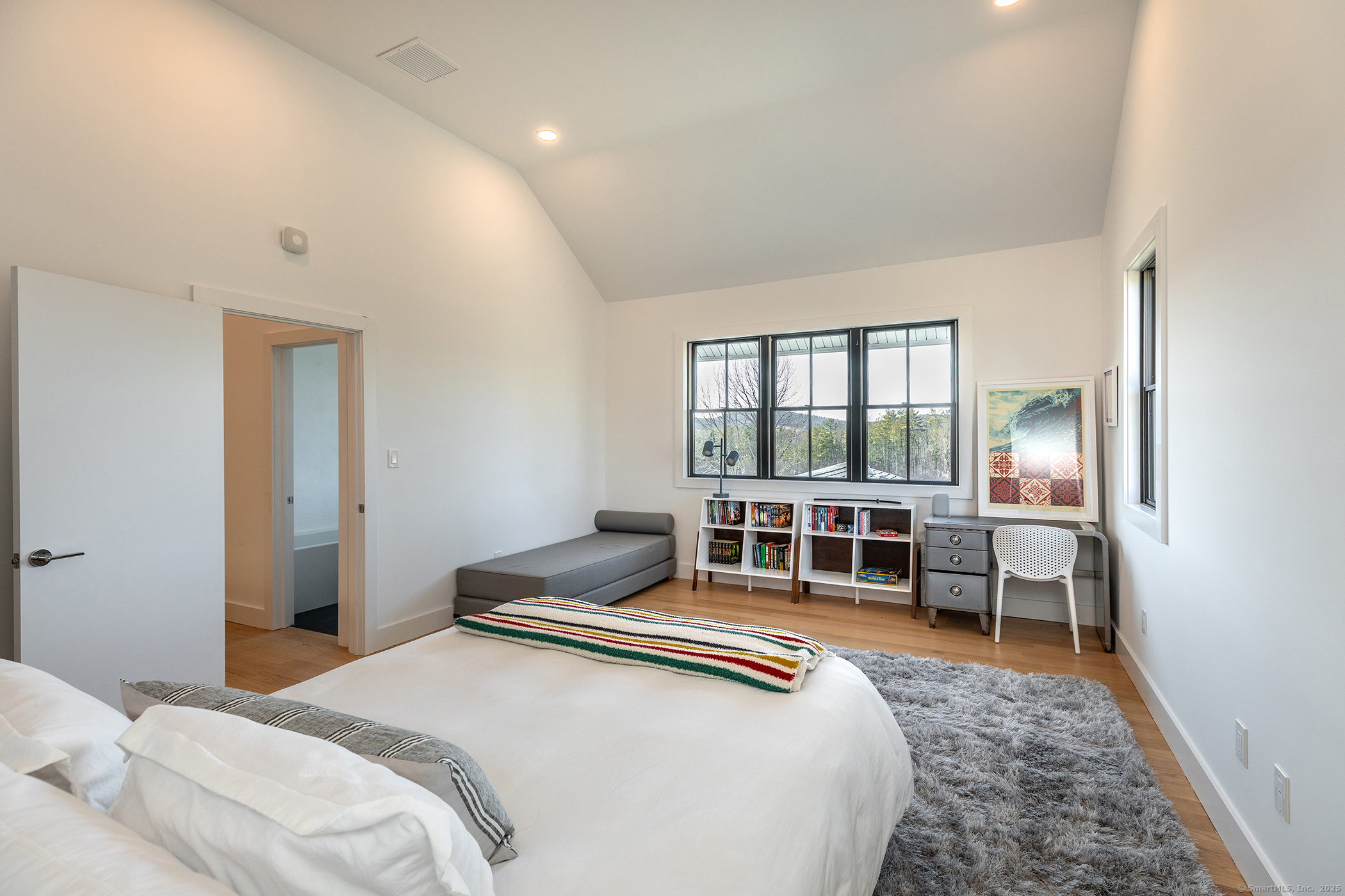 323 Wells Hill Road Salisbury, CT 06039 - Photo 24 of 31 a bedroom with a bed and a large window