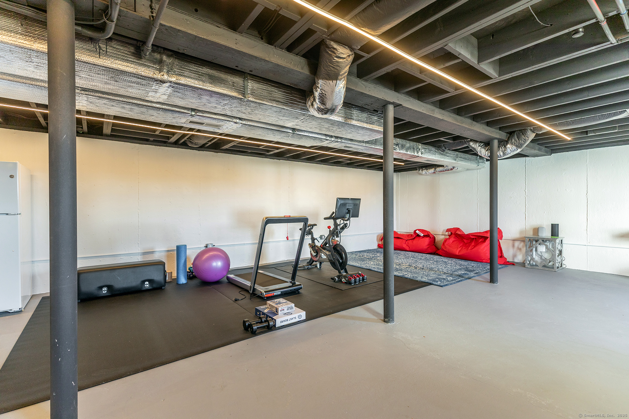 323 Wells Hill Road Salisbury, CT 06039 - Photo 25 of 31 a view of a room with gym equipment