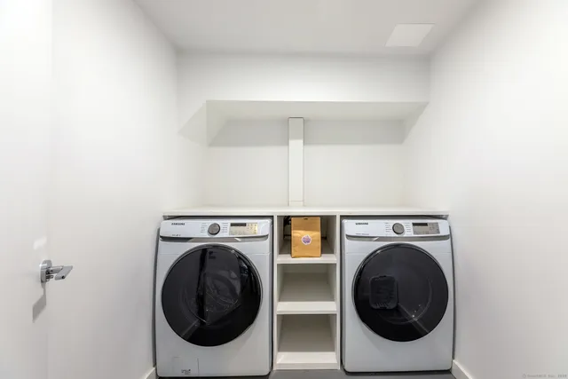 a utility room with dryer and washer