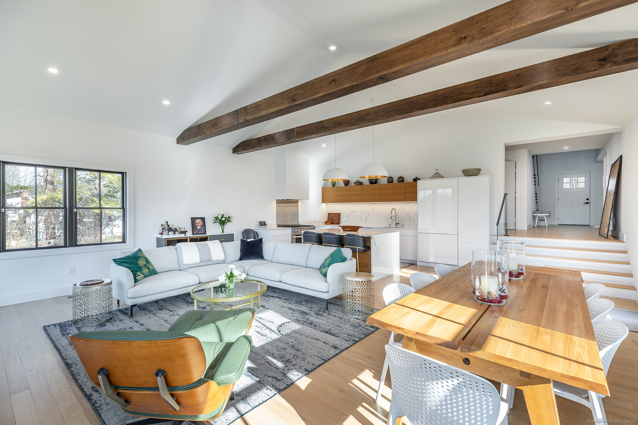 323 Wells Hill Road Salisbury, CT 06039 - Photo 8 of 31 a living room with furniture and a large window