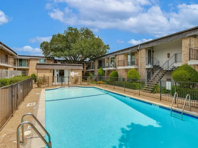 a front view of house with yard and outdoor seating