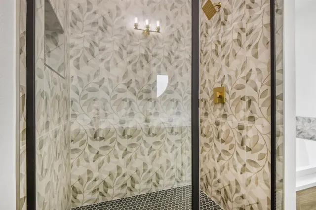 a bathroom with a bathtub and a toilet