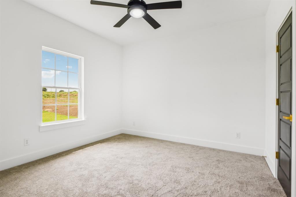 6605 Buffalo Ridge Circle Godley, TX 76044 - Photo 28 of 38 an empty room with a window