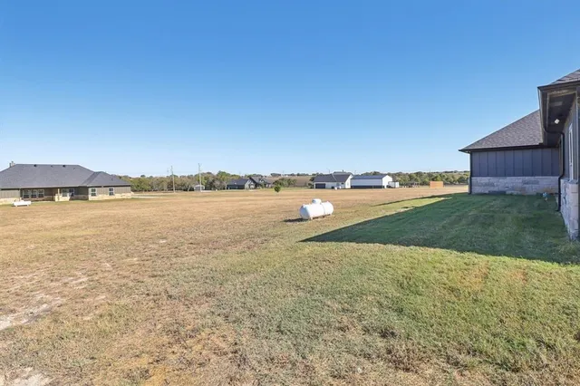 a house view with a swimming pool