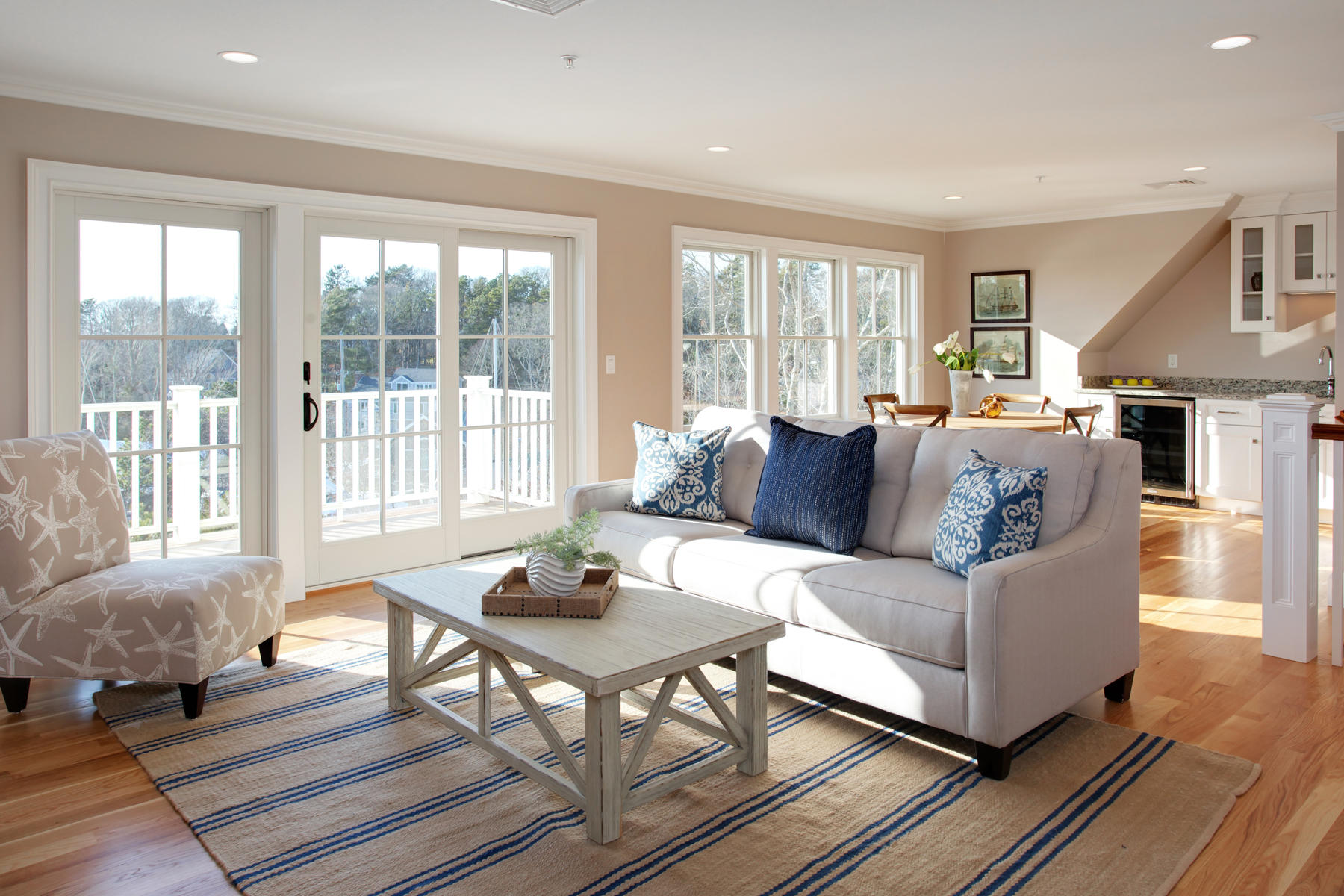 1090 Shore Road, Unit 8 Pocasset, MA 02559 - Photo 13 of 32 a living room with furniture and a large window